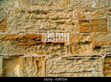 Weathered sandstone wall. Stock Photo