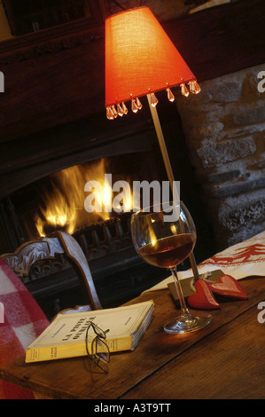 evening mood in mountains holidays in front at a fireside Stock Photo