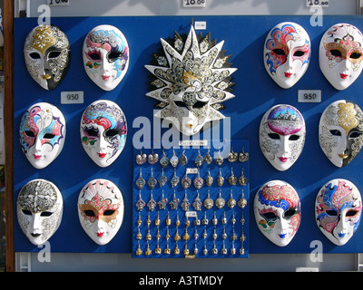 Colourful Venetian facial masks for sale in Venice Veneto Italy Europe EU Stock Photo