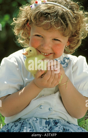 Little goose and girl Stock Photo