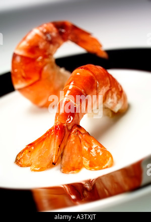 King Prawn Tails Cooked "shell on" unpeeled. Stock Photo
