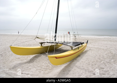 Catamaran on the white sand beach of the Gulf of Mexico. North Redington Beach Florida USA Stock Photo