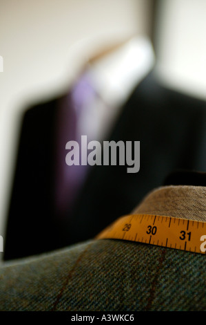 Tape measure on a tailors dummy Stock Photo