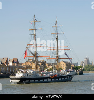 The Tall Ships Youth Trust Prince William registered in Glasgow sailing up the River Thames at Canary Wharf Stock Photo