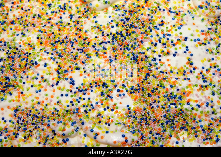 cream with small candy balls for background Stock Photo