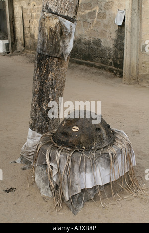 Voodoo Legba Statue outside a home to protect the house , Benin Stock Photo