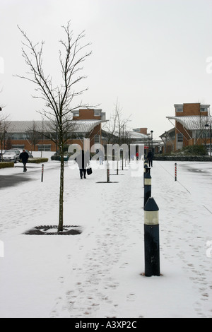 Office Workers trudge through the snow Stock Photo - Alamy