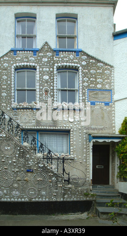 house covered in shells Polperro Cornwall Stock Photo