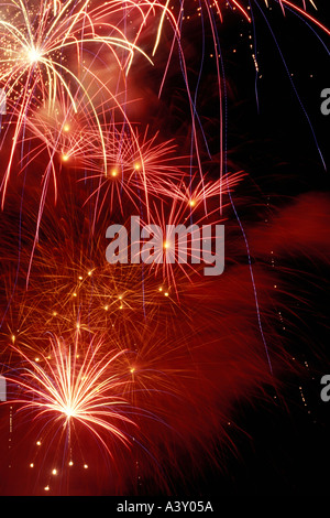 Many fireworks going off in the night sky Stock Photo