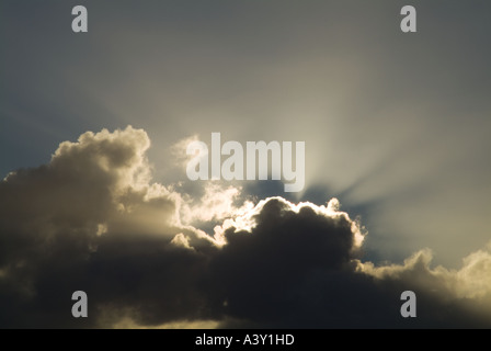 dh storm clouds CLOUDS BACKGROUND Black and grey sunlight from white sun stormy sky uk backlit cloud sunbeam moody rays silver lining