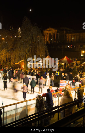 dh Princes Street Gardens PRINCES ST GARDENS EDINBURGH Winter wonderland ice rink and funfair New Year time at night Stock Photo