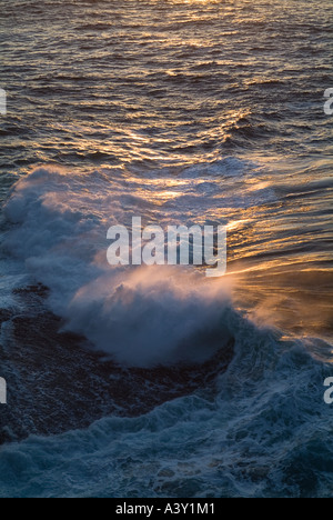 dh  YESNABY ORKNEY Surf sea waves breaking on seacliff rocks break crash spray fresh wild wave close up Stock Photo