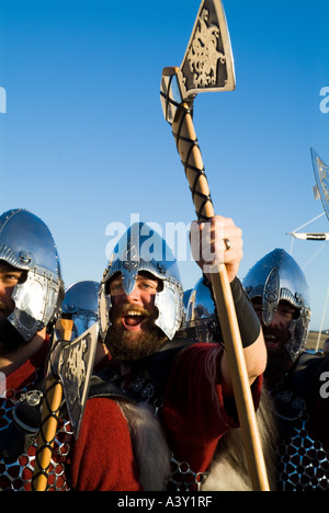 dh Up Helly Aa procession LERWICK SHETLAND Jarl warriors Viking cheering with axe bearded norse man close warrior weapons scotland Stock Photo