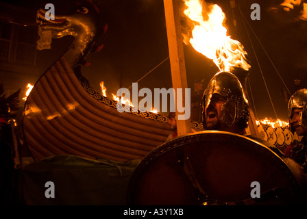 dh Up Helly Aa fire procession LERWICK SHETLAND January Vikings Viking longship galley squad festival parade Stock Photo