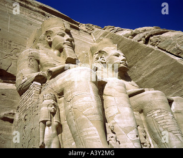 geography / travel, Egypt, Abu Simbel, buildings, Greater temple of Ramesses II, exterior view, facade, detail, two statues of pharaoh, sitting, built 13th century BC, , Stock Photo