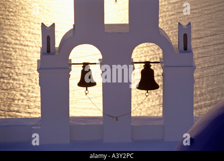 belltower of church at sunset village of firostefani island of santorin islands of cyclades greece Stock Photo