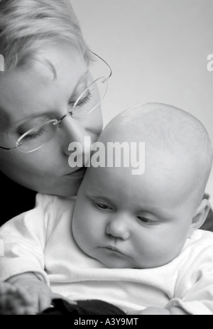 people, human beings, humans (Homo sapiens sapiens), mother kissing baby Stock Photo