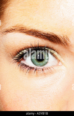 Close up of womans eye looking straight on Stock Photo