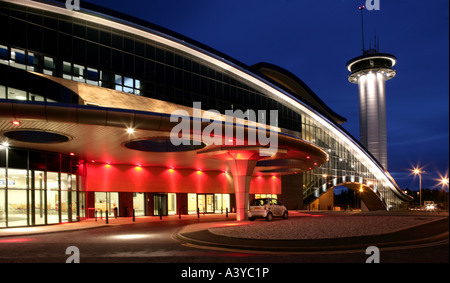 Aberdeen exhibition and conference centre in early dawn light with multicoloured lights and interesting architecture Stock Photo