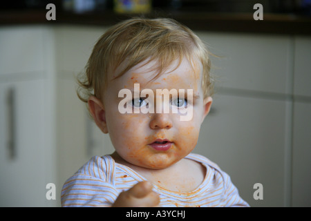 portrait of a small boy with dirty face Stock Photo
