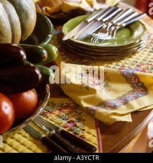 detail of a set table with Provençal table linen Stock Photo