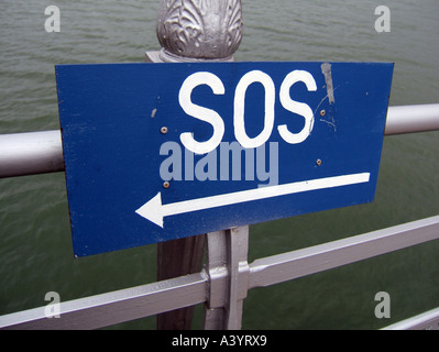 sos notice on pier, bangor, wales Stock Photo