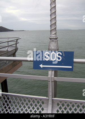 sos notice on pier, bangor, wales Stock Photo