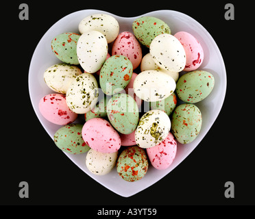 EASTER EGGS IN HEART DISH Stock Photo
