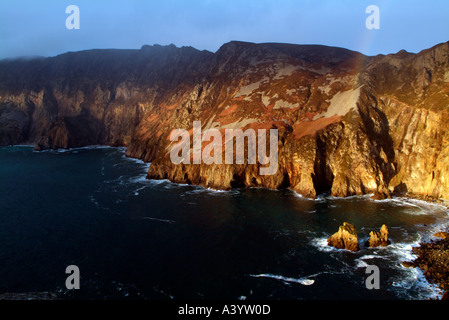 Dramatic ray of light illuminating Slieve League before an approaching storm in County Donegal Ireland Stock Photo