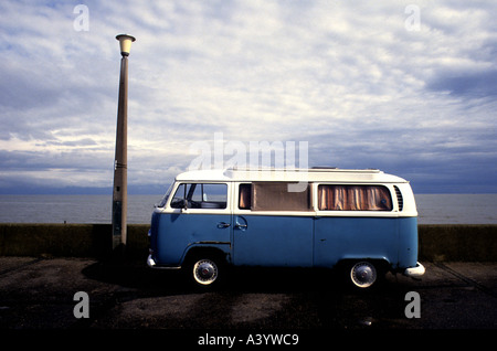 VW camper van parked beside the North Sea in Southwold Suffolk, UK. Stock Photo