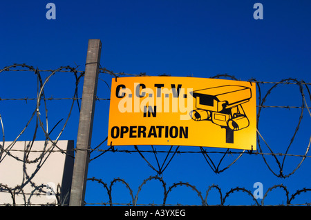 A Vivid Graphic Sign,Warning That A Security CCTV,Is In Working Operation. Stock Photo