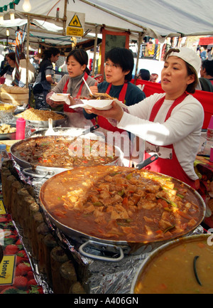 serving food at Camden Market London England Stock Photo