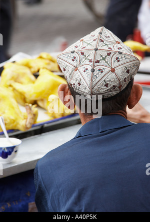 Uighur Man Wearing Kufi Stock Photo