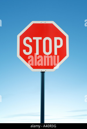 stop sign Stoppschild vor blauem Wolkenhimmel Stock Photo