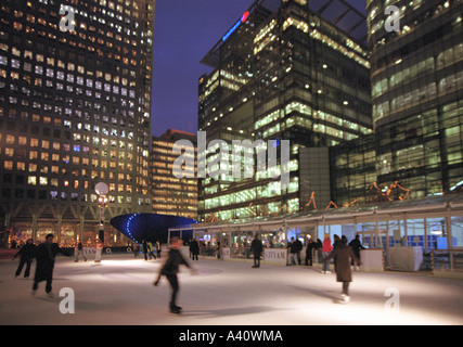 people skating on the Ice Rink in Canada Square at Canary Wharf London Stock Photo