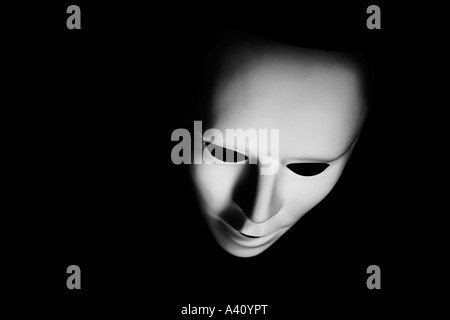 Costume mask photographed in moody lighting Stock Photo