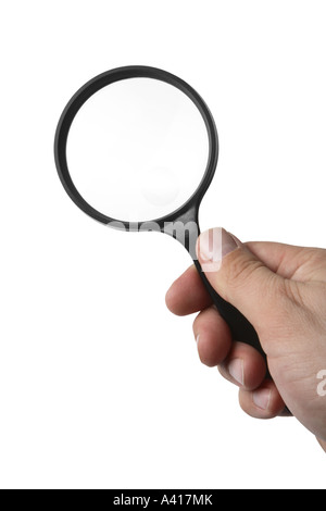 Hand Holding Magnifying Glass Stock Photo