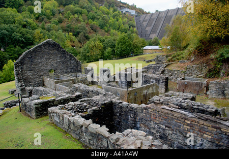 Remains of 19th century Bryntail Lead Mine below dam of Clywedog reservoir Powys Mid Wales UK Stock Photo