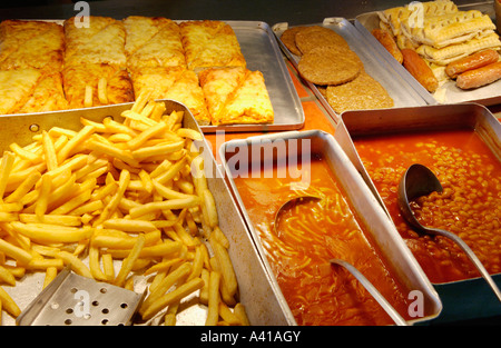 School dinners on hot counter waiting to be served in school refectory UK Stock Photo