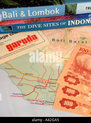 Bali guidebook Indonesia dive guide Garuda air ticket Indonesian rupiah currency map of Bali Stock Photo