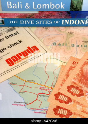 Bali guidebook Indonesia dive guide Garuda air ticket Indonesian rupiah currency map of Bali Stock Photo