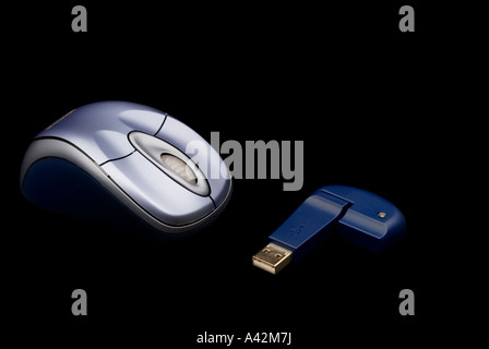 Blue cordless computer mouse on black background Stock Photo