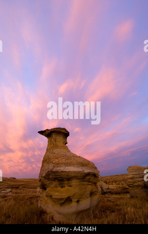 Sunset skies over sandstone hoodoos, Writing on Stone Provincial Park, Alberta, Canada Stock Photo