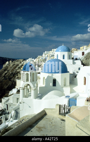 Village of Oia on the island of Thira,/Santorini, Mediterranean Sea,perched on top of high cliffs Stock Photo