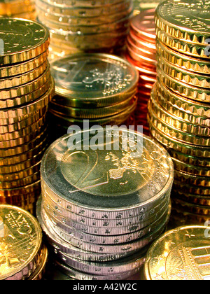 many euro coins stacked viele Euromünzen gestapelt Stock Photo