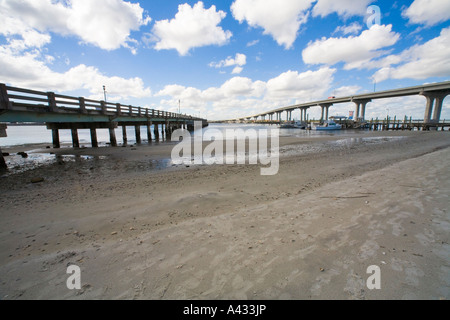 The fishing pier and bridge over the Intracoastal Waterway, Vilano Beach, near St. Augustine, Florida. Stock Photo