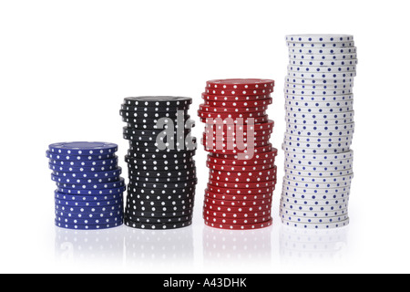 Stacks of Poker Chips cut out on white background Stock Photo