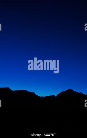 Venus rises in the blue dawn light over the hills of Sedona, Arizona Stock Photo