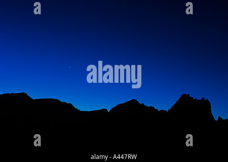 Venus rises in the blue dawn light over the hills of Sedona, Arizona Stock Photo