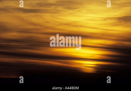 High Cirrus clouds create a strange abstract performance in the skies above Lizard Peninsula, Cornwall UK Stock Photo